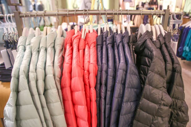 Colorful winter jackets on a rack