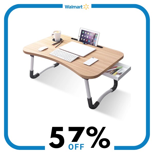 A tan lap desk with items on it