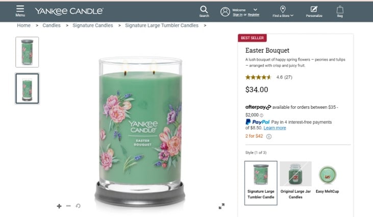 A screenshot of Yankee Candle’s website displaying a their Floral Bouquet candle – a light green candle in a floral-themed holder