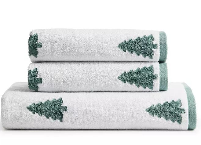 white towels with green christmas trees