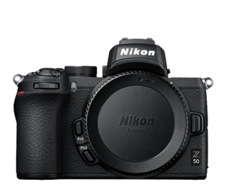 A black compact Nikon Z50 digital camera with closed lens