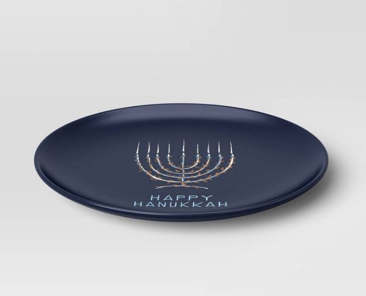 dark blue serving dish with image of menorah and happy hanukkah lettering