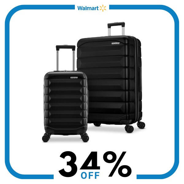 Two black hardshell rolling suitcases