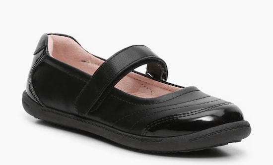 One black Kelly & Katie Francis Mary Jane Flat with a velcro strap 
