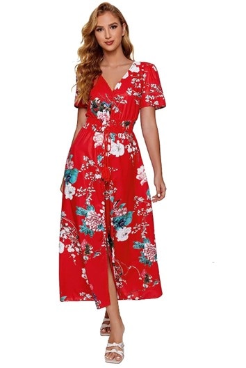 Dark blonde model with wavy hair dressed in the red and floral Milumia women’s button-up, flowy, maxi dress, paired with white sandals.