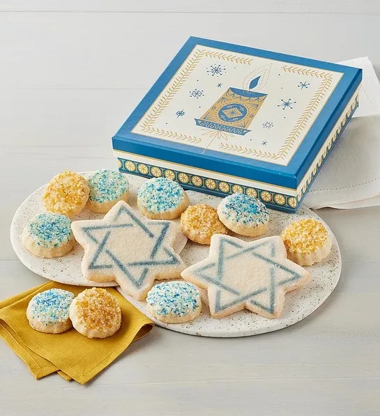 Hanukkah-themed blue cookie box with 6 vanilla shortbread cookies in blue and 4 vanilla