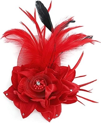 Red rose-shaped feathered hat with small red beads in the center and a black feather as a detail