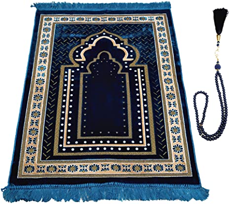 A blue and gold Bto Store TB Muslim Prayer Mat in front of a blue-lit background
